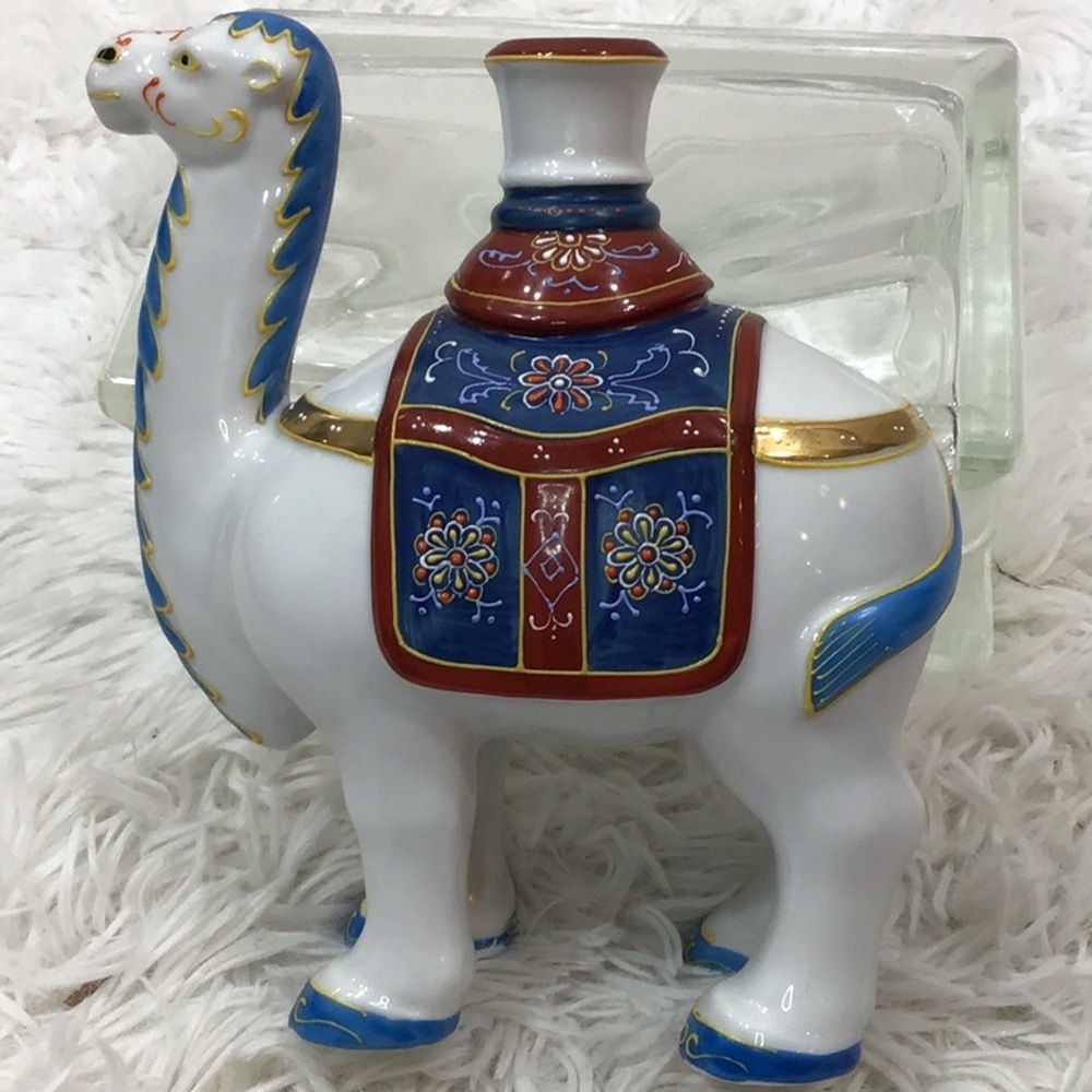 Vintage hand painted porcelain camel candleholder